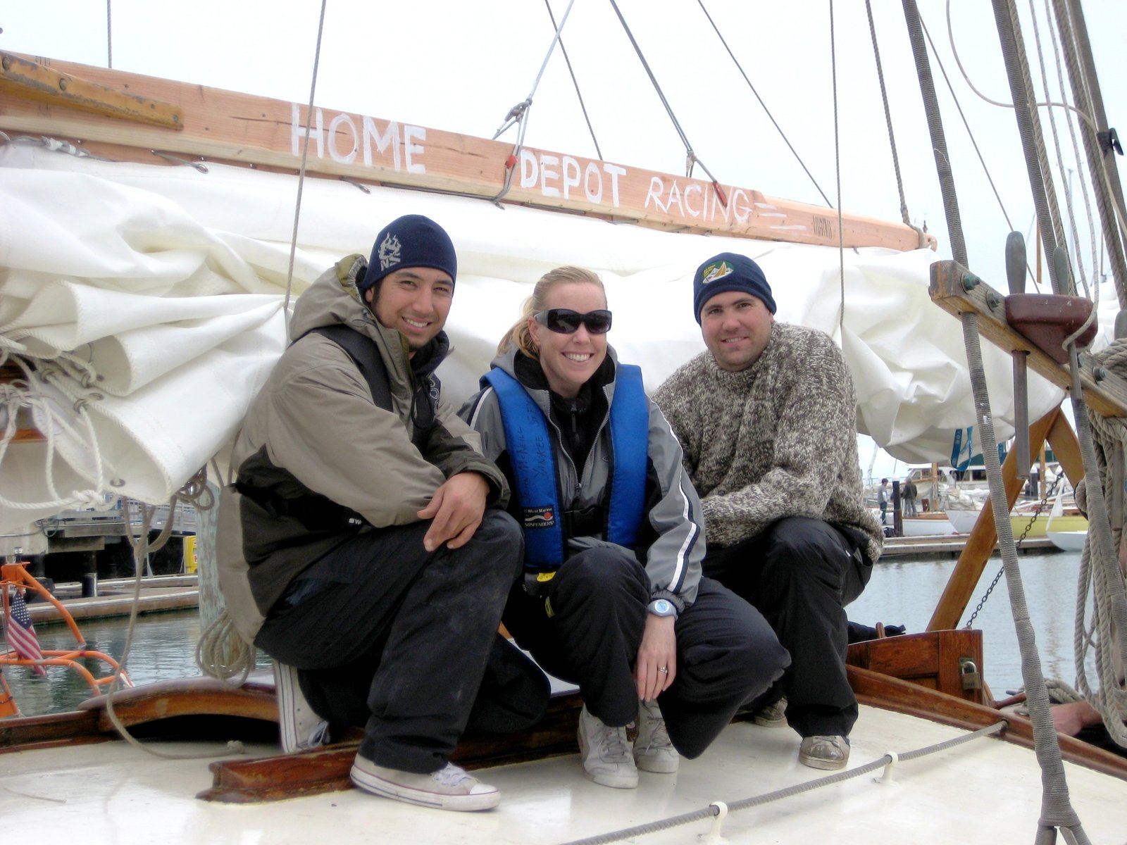 The crew poses beneath the improvised Home Depot Racing main gaff