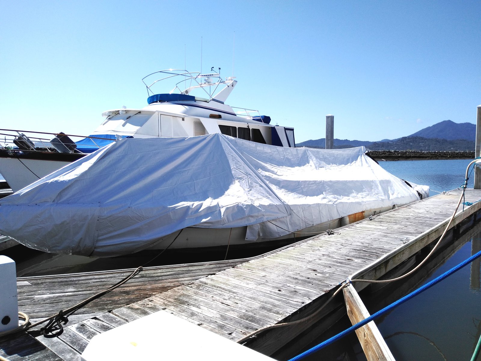 Yankee under a protective tarp at Loch Lomond Marina